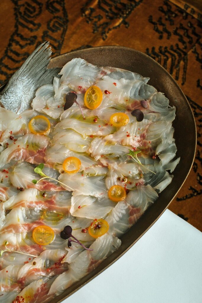 Sashimi de Lubina en Jacqueline Restaurante Mediterráneo - Pescado y Marisco Fresco y Carne Nacional | Jacqueline Barcelona Sashimi de Lubina en Jacqueline Barcelona - Pescado y Marisco Fresco y Carne Nacional | Jacqueline Barcelona